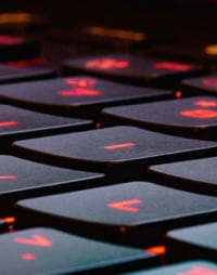 Close-up of a black-and-red laptop keyboard